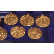 Gold solar disc pendants